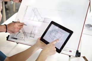 Designer drawing plans from a digital tablet - Photo copyright Oli Kellett / Getty Images
